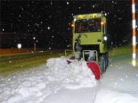 ブレード装置による除雪の写真