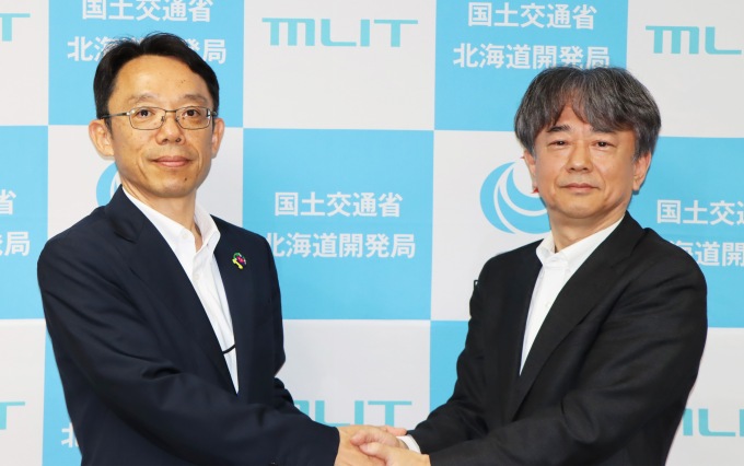 岡下局長、遠藤前局長