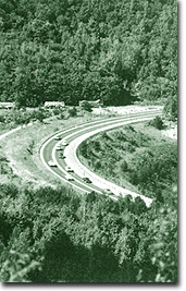 昭和54年路線改良（ショートカット）された張碓橋にかわる現道